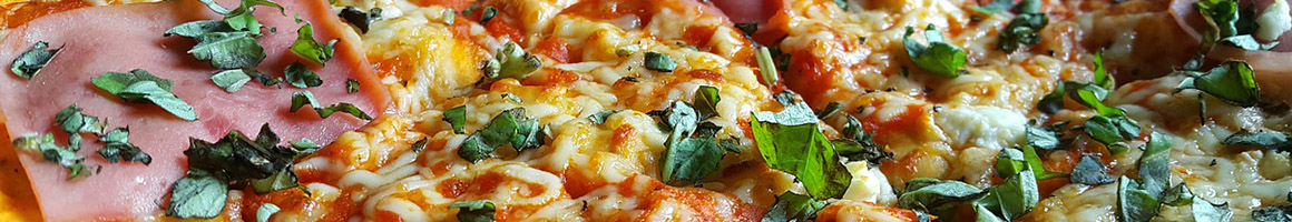Eating Italian Pizza at La Nostra Pizzeria restaurant in New York, NY.